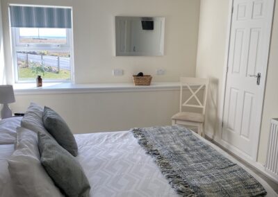 Main bedroom and window Heisgeir View Holiday Cottage